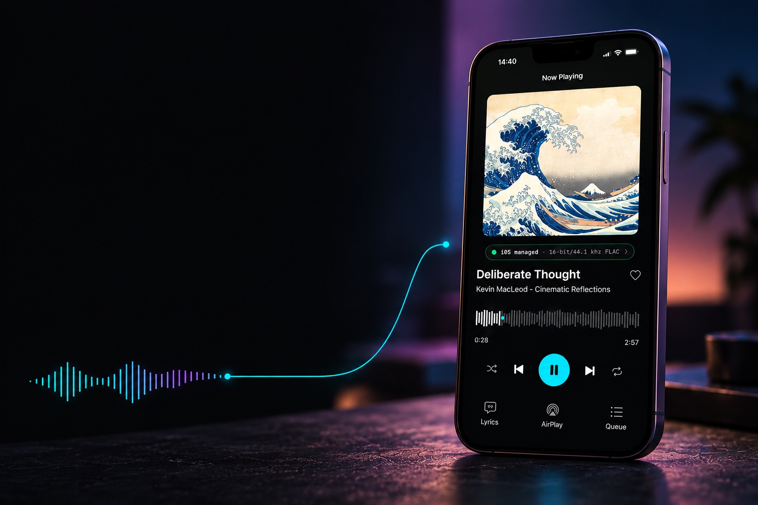 Điện thoại hiển thị PureBit Now Playing trên bàn trong ánh sáng studio